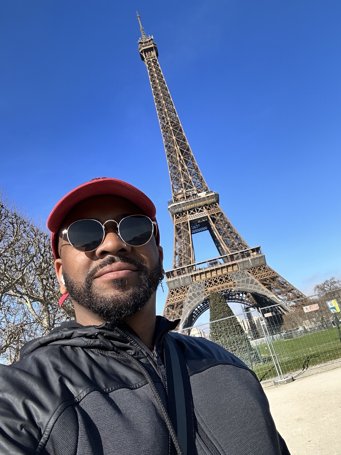 Jamere Bowers in front of the Eiffel Tower in Paris