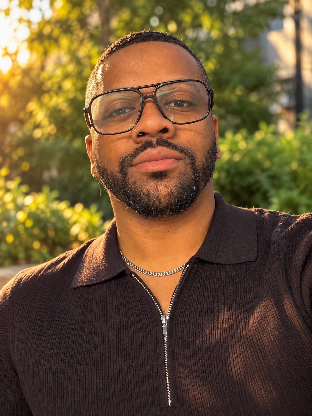 Jamere Bowers outdoors in warm golden-hour sunlight